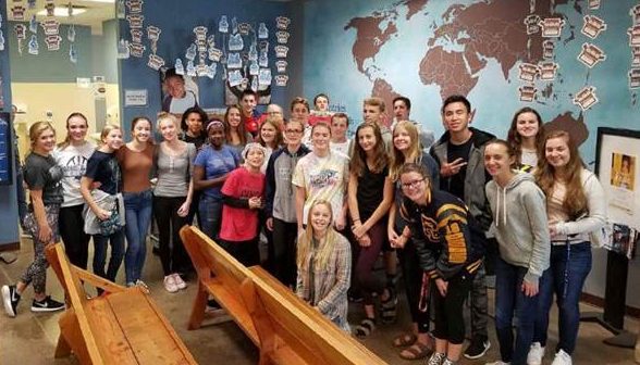 The Prior Lake Junior Optimist Club volunteering at Feed My Starving Children