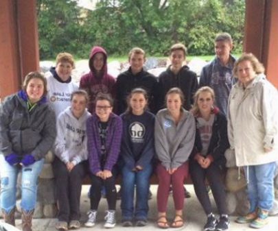 The members of the Prior Lake Interact club planting gardens at city hall. 