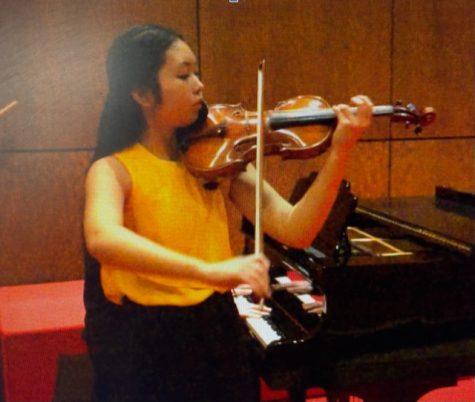 Breanna Lee plays the violin at a recent performance