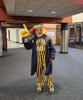 Sheldon dressed in school spirit before going out to monitor the crosswalk