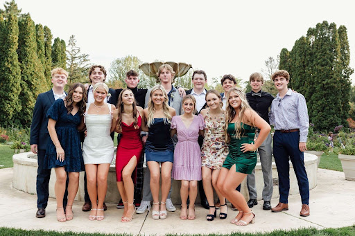  Céleste posing with friends before the Homecoming dance