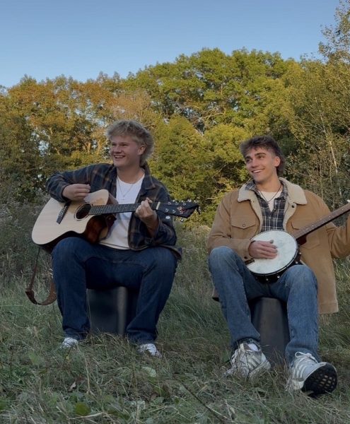 Lukas and Max playing a song in Murphy Hanrehan park